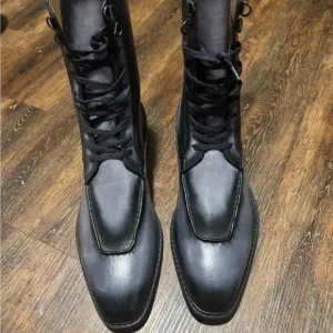 Alex 5IVE buck boots .  Grey in color with black patina