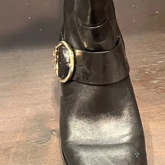 Black with gold accents Tory Burch knee boots, size 7