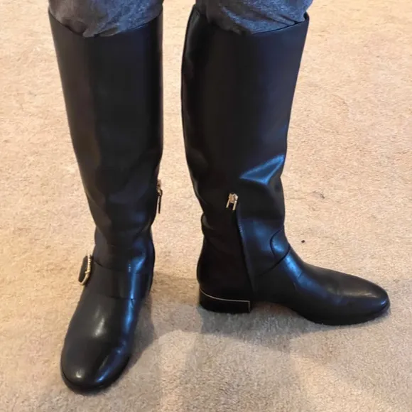Black with gold accents Tory Burch knee boots, size 7