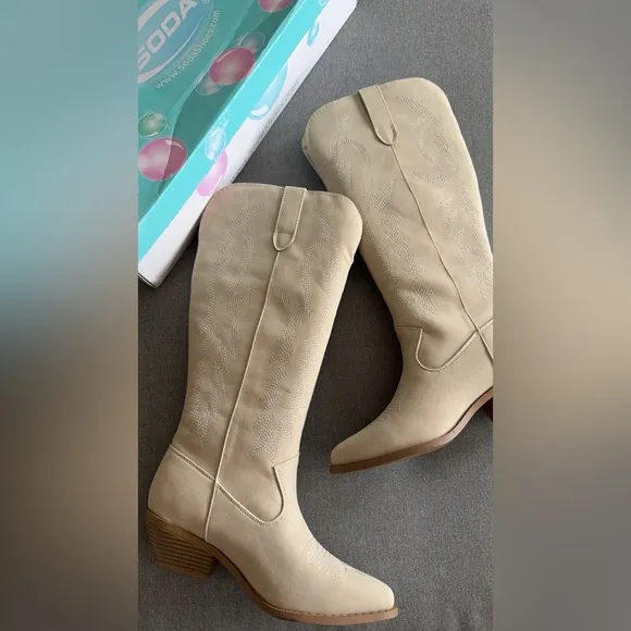 Gorgeous stitched cowboy boots in sand