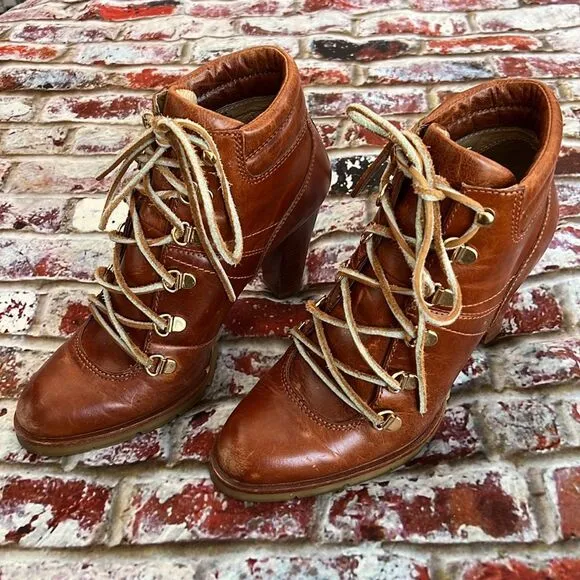Michael Kors distressed brown leather ankle boots with raw leather tie