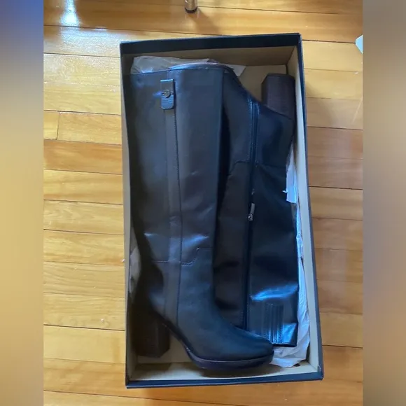 New black leather heeled boots