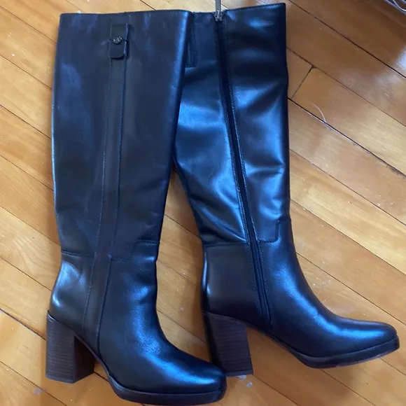 New black leather heeled boots