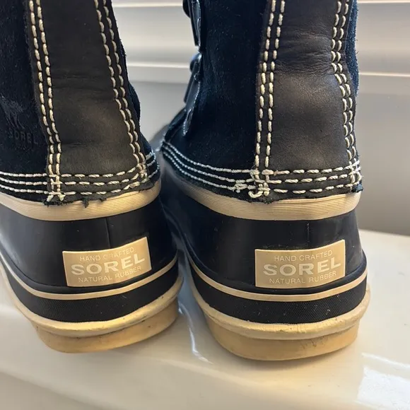 Sorel Black and Tan Lace Up Boots with Faux Fur Trim