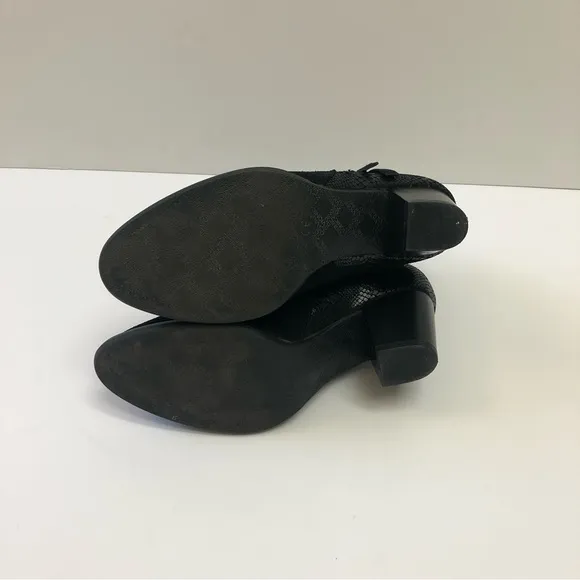 Vionic Anne black side zip booties.